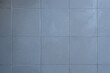 © Mariia - abstract background of an old grey ceramic tiles close up