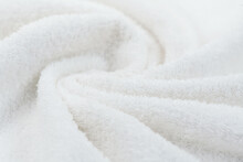 Towel Texture Closeup. Soft White Cotton Towel Backdrop, Fabric Background. Terry Cloth Bath Or Beach Towels. Soft Fluffy Textile. Macro, Texture 