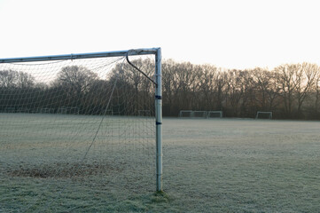 Wall Mural - Goal post on empty soccer field