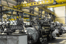 Diesel Locomotive Engine In A Repair Depot Workshop With Overhead Crane