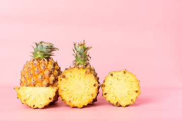 Fresh pineapple fruit on pastel pink background, Tropical fruit