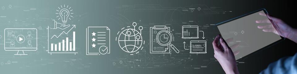 Content marketing concept with woman hand using a digital tablet computer on grey background.