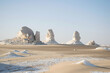 © Marjolein Hameleers - white desert with sand and lime stone rock formations. Bahariya national park Egypt. Surreal nature landscape. Scenic travel destinations africa.