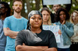 © Roman - portrait of angry serious woman tired of enduring humiliation and insults, people protest in the streets and parks. black lives matter concept