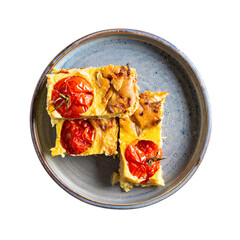 Wall Mural - Vegetable clafoutis on gray plate isolated on white background, savory pie with cabbage and whole cherry tomatoes. Vegetarian cuisine. Top view.