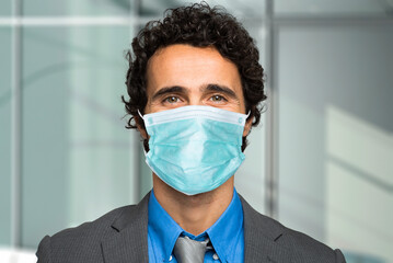 Poster - Businessman wearing a mask, coronavirus concept