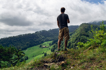 Young, fit man looking toward into the distance