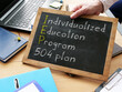 © Andrii - Individualized education program IEP 504 plan is shown on the conceptual business photo