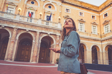 Wall Mural - tourist visiting the city of Recanati, Province of Macerata, Marche Region, Italy