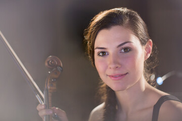 Wall Mural - Portrait of smiling violinist