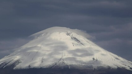 Wall Mural - Crater between clouds of popocatepetl volcano in Mexico