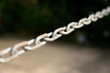 old rusty chain with blur background , selected focus