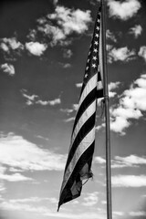 Sticker - American flag against blue sky landscape, USA