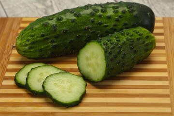 Ripe fresh green two cucumbers