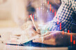 © peshkova - Multi exposure of two men planing investment with stock market forex chart.