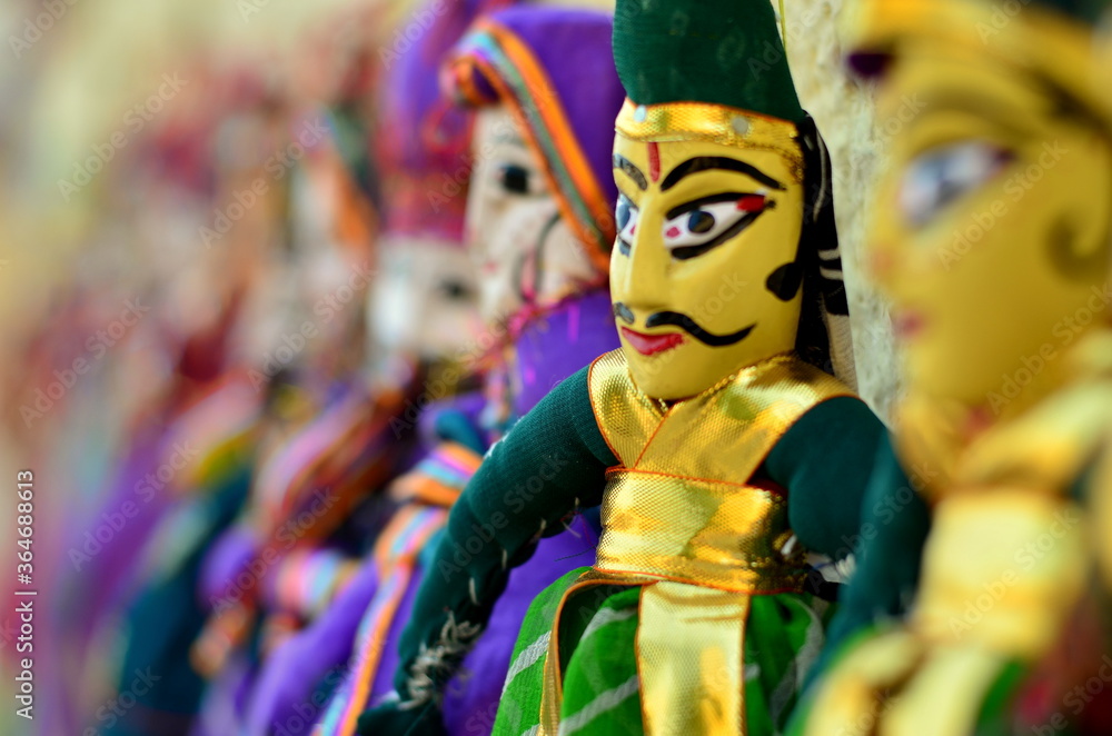 Indian String Puppet Rajasthani puppets (Kathputli) on display at shop in Mehrangarh Fort in ...