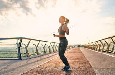 Wall Mural - Woman doing sport on street