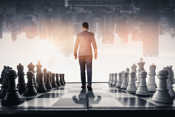 businessman walking on chessboard 