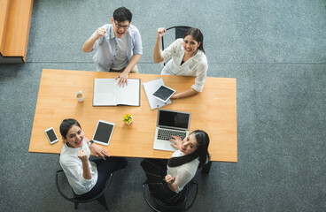 Top view of  asian business people team analyzing statistics financial. High angle view of a team of businesspeople Meeting Conference Discussion Corporate Concept in office.