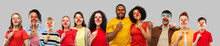 Charity And Red Nose Day Concept - Group Of Happy Smiling People With Clown Noses Hugging Over Grey Background