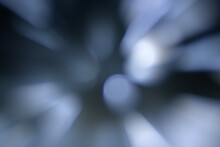 Blurred Lights Dark Gray Blue Background. Abstract Soft Explosion Effect. Centric Motion Pattern
