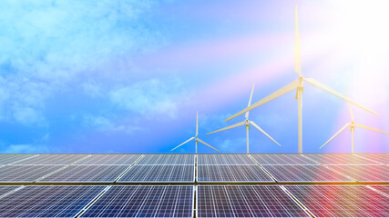 Solar panels and wind power generation and aerial photo of new energy solar photovoltaic panels outdoors at sunrise. landscape against blue sky with clouds.