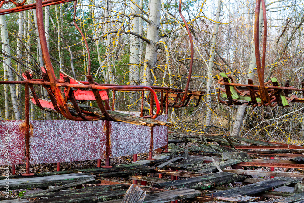 Abandoned carousel at an amusement park in the center of the city of ...