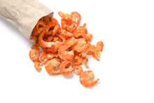 Top View Bag With Big Size Dry Shrimps On A White Background