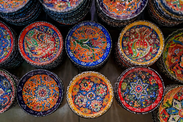 Montenegrin hand painted decorative plates with a floral pattern in at a souvenir shop in Kotor old town in Montenegro