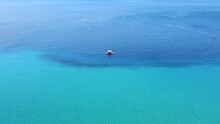 Tourists Sailing In Pedal Boat On Beautiful Exotic Blue Sea. Aerial View 