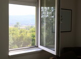 Fototapeta  - Open window with nature landscape view from inside house, apartment interior