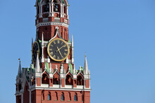 Chimes Of Spasskaya Tower, Symbol Of Russia On Red Square. Moscow Kremlin Tower Isolated On Blue Sky Background