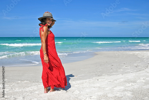 Beatiful Mature Woman in Red Dress © EyeMark
