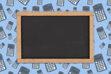 Blank grunge chalkboard sign with calculator