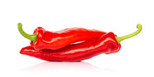 Two Red Hot Chili Pepper Isolated On White Background, Looking Like People Having Sex In 69 Posture