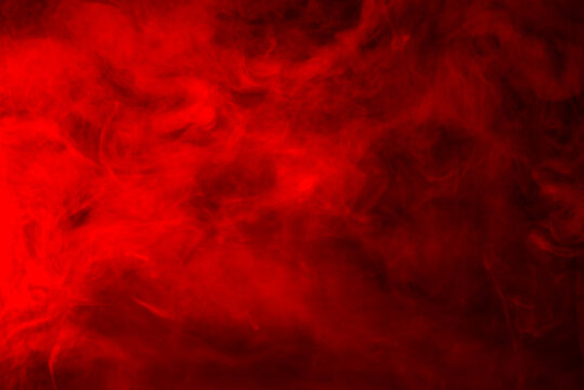 Fototapete - Red smoke on a black background, abstract background