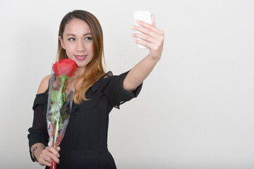 Wall Mural - Portrait of young beautiful Asian woman ready for Valentine's day