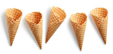 Set Of Empty Ice Cream Cones On White Background