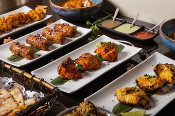 Sticker - Dinner table with fried meat dishes and sauces