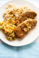 Wall Mural - Pork tenderloin in creamy whiskey sauce, with brown rice and salad