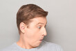 © Andrei Korzhyts - Portrait of funny surprised man, looking at something extraordinary