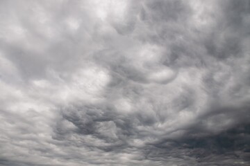 Wall Mural - Dramatic gray clouds in the rainy sky