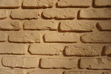 Yellow Brown Painted Brick Wall