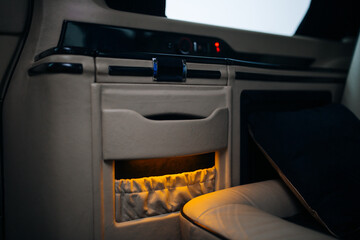 Wall Mural - Luxury leather seats in the comfortable van. Interior of luxury minivan with backlight, transfer car