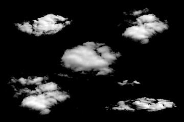 Poster - five white natural clouds isolated on a black background.