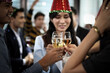 © torsakh - Business people or team or friend or colleagues are drinking together with glass of champagne or alcohol in party after work, happy new year celebration fun in office