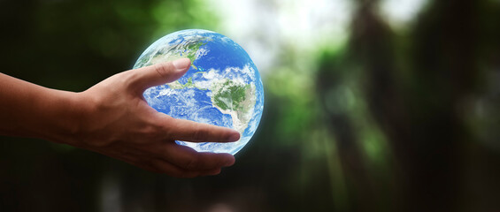 Wall Mural - concept- man holding planet earth in his hands- elements of this image furnished by NASA
