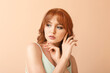 © Pixel-Shot - Beautiful young redhead woman on color background