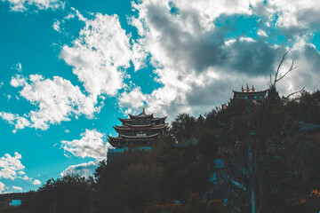 Guishan temple with giant buddhist tibetan prayer golden wheel in old town Shangri la