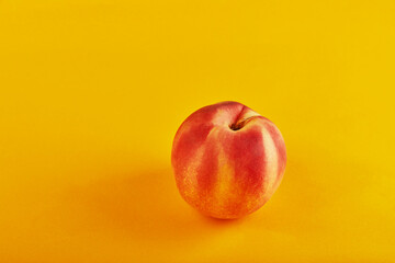 Poster - Fresh juicy peach isolated on an orange background